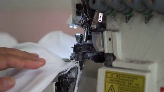 专业裁缝服装设计师用缝纫机缝制衣服