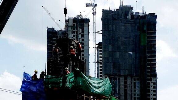 建筑工地工人香港在建的摩天大楼