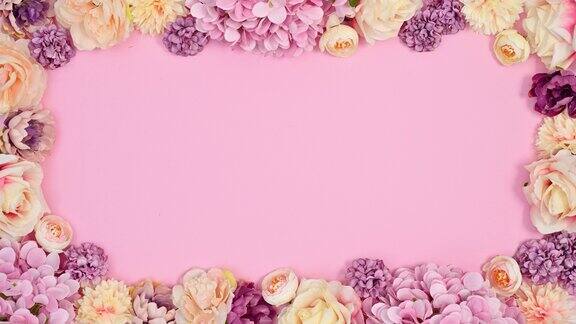 浪漫的花框架制成的柔和的春天花朵在柔和的粉红色主题停止运动