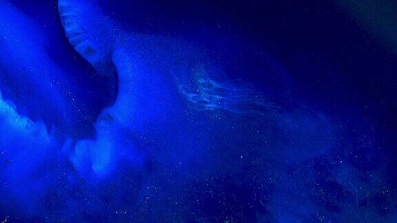 流动的不同深浅的蓝色为艺术背景抽象的丙烯酸背景