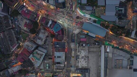 黄昏照亮吉隆坡市区空中俯视图4k马来西亚