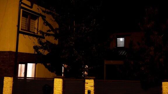 拍摄住宅楼夜间灯光开关的场景