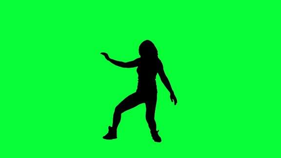 舞者在绿色背景下的剪影