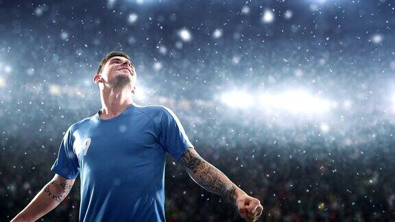 一名足球运动员在下雪的职业球场上庆祝胜利快乐地跳跃