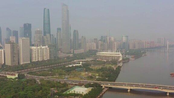 阳光明媚的一天广州市区交通大桥著名体育场滨江航拍全景4k中国