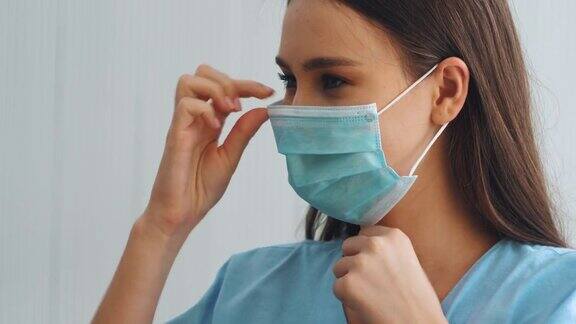 美丽的女病人戴着防护口罩