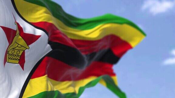 津巴布韦国旗在晴朗的日子里迎风飘扬的细节