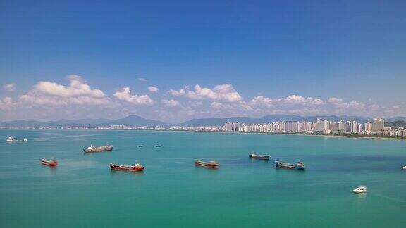 三亚市湾阳光日著名的酒店度假屋顶全景4k时间推移海南岛中国