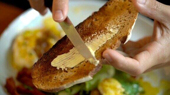 SLOMO-在一片面包上涂黄油