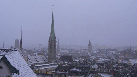 瑞士晚上冬天雪屋顶苏黎世观景台城市全景4k