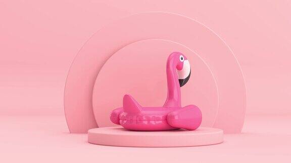 4k分辨率的视频:夏季游泳池充气橡胶粉红色火烈鸟玩具旋转在粉红色圆柱体产品舞台底座上的粉红色背景