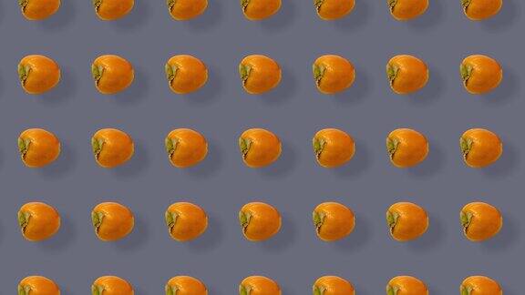 鲜艳图案的鲜橙柿子前视图无缝的柿子图案波普艺术设计现实的动画4k视频运动