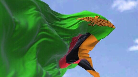 赞比亚国旗在晴朗的日子里迎风飘扬的细节