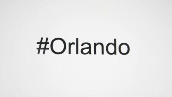一个人在电脑屏幕上输入“#Orlando”