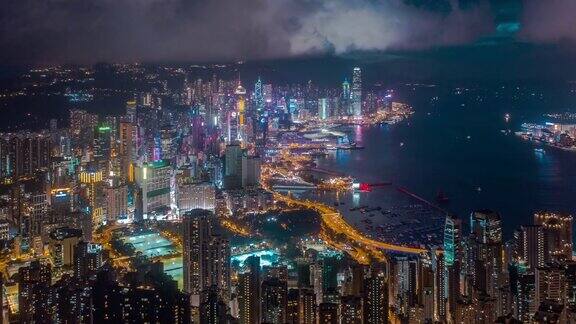 香港城市的超维多利亚港夜间鸟瞰图