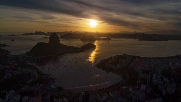 日落天空飞行在里约热内卢的里约热内卢城市湾航空全景4k时间间隔巴西