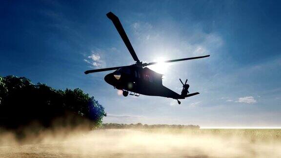 在一个晴朗的日子里一架黑鹰军用直升机降落在一片荒芜地区的一条尘土飞扬的道路上