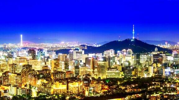 美丽的夜晚城市韩国首尔的城市景观首尔塔现代建筑和夜间建筑