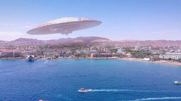 外星人飞碟在大型度假城市沙漠附近的海航拍
