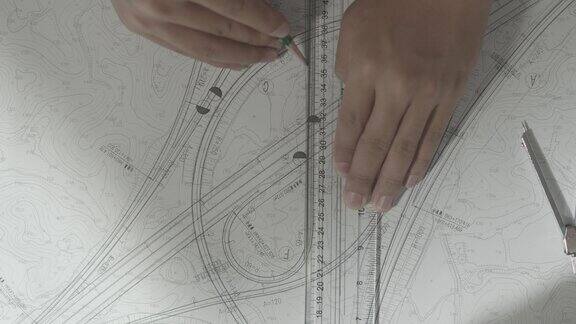设计师画图纸建筑道路规划设计