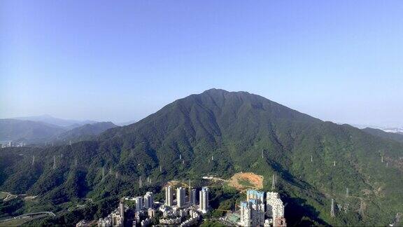 航拍梧桐山城市建设电塔电力输送