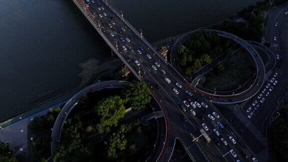 航拍南昌日落时分环形道路繁忙车流