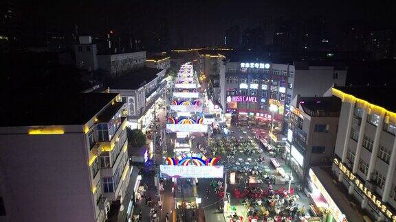 河南新乡市夜景步行街人流航拍